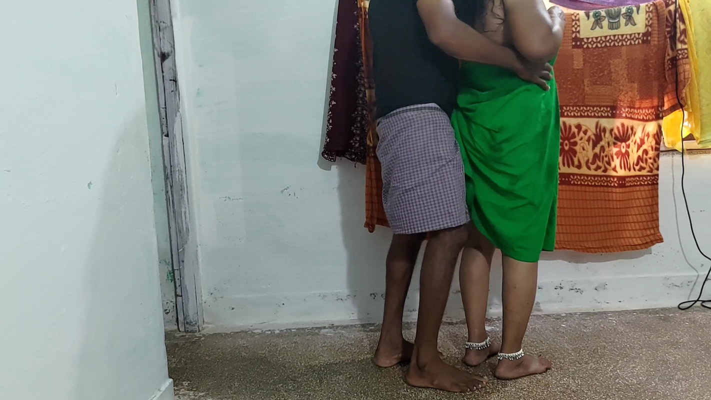 Aunty was tying the skirt and fixing the cloth and I stroked her and made her romantic