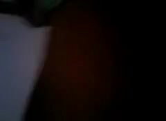 young couple kissing in bedroom