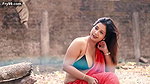 Nandita Showing Deep Cleavage and Navel in Low Waist Red Saree