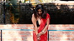 Nandita Showing Deep Cleavage and Navel in Low Waist Red Saree