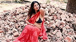 Nandita Showing Deep Cleavage and Navel in Low Waist Red Saree