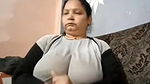 NAUGHTY DESI INDIAN AUNTY SHOWING OFF HUMONGOUS NATURAL TITIES