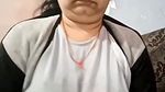 NAUGHTY DESI INDIAN AUNTY SHOWING OFF HUMONGOUS NATURAL TITIES