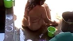 aunty bathing in open
