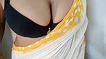 Desi bengali shruti bhabhi teasing with her big natural tits in yellow saree