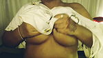 Hot sexy girl shows her big boobs by pressing them