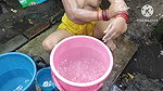 Indian bhabhi bathing outside with