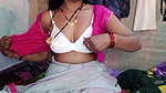 Hot Indian aunty pressed her big tits and got great pleasure by massaging her step son’s penis