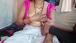 Hot Indian aunty pressed her big tits and got great pleasure by massaging her step son’s penis