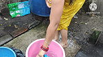 Indian bhabhi bathing outside with