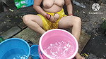 Indian bhabhi bathing outside with
