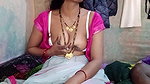 Hot Indian aunty pressed her big tits and got great pleasure by massaging her step son’s penis
