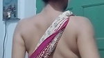 Saree without a bra and a blouse.