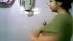 Young maal in bathroom
