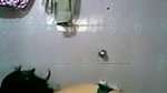 Young maal in bathroom