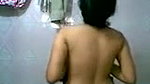 Young maal in bathroom