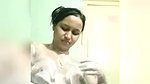 In bathroom, bathing