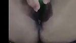 A sexy wife play with a cucumber