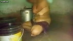 Indian aunty bathing in village home