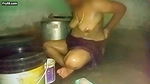Indian aunty bathing in village home