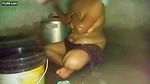 Indian aunty bathing in village home