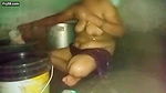 Indian aunty bathing in village home