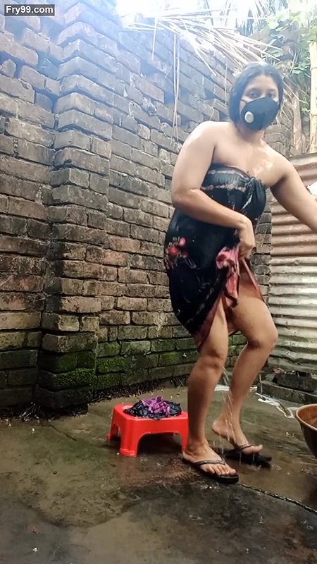 Shower scene of Bangladeshi village girl akhi looking beautiful with sexy dress. Teen hot girl is bathing in the bathroo