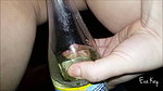 a kay Peeing in a bottle