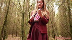 she is walking through the woods and pees with her