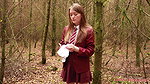 she is walking through the woods and pees with her