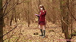 she is walking through the woods and pees with her