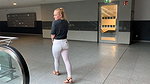 Devil Sophie Wet in white jeans before departure at the airport