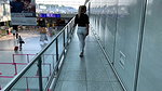 Devil Sophie Wet in white jeans before departure at the airport