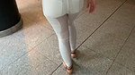 Devil Sophie Wet in white jeans before departure at the airport