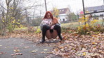 Redhead Babe Relieves Herself In Public Got2pee