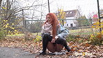 Redhead Babe Relieves Herself In Public Got2pee