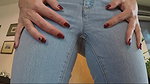 Julia peeing jeans and panties and masturbating