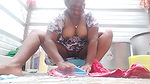 Bouncy boobs washing clothes