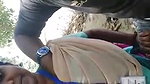 Giving outdoor blowjob to colleague