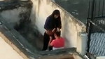 Young lover having on roof,captured