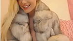 Candi in fur smoking
