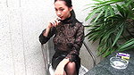 Young girl smokes topless and in leather skirt