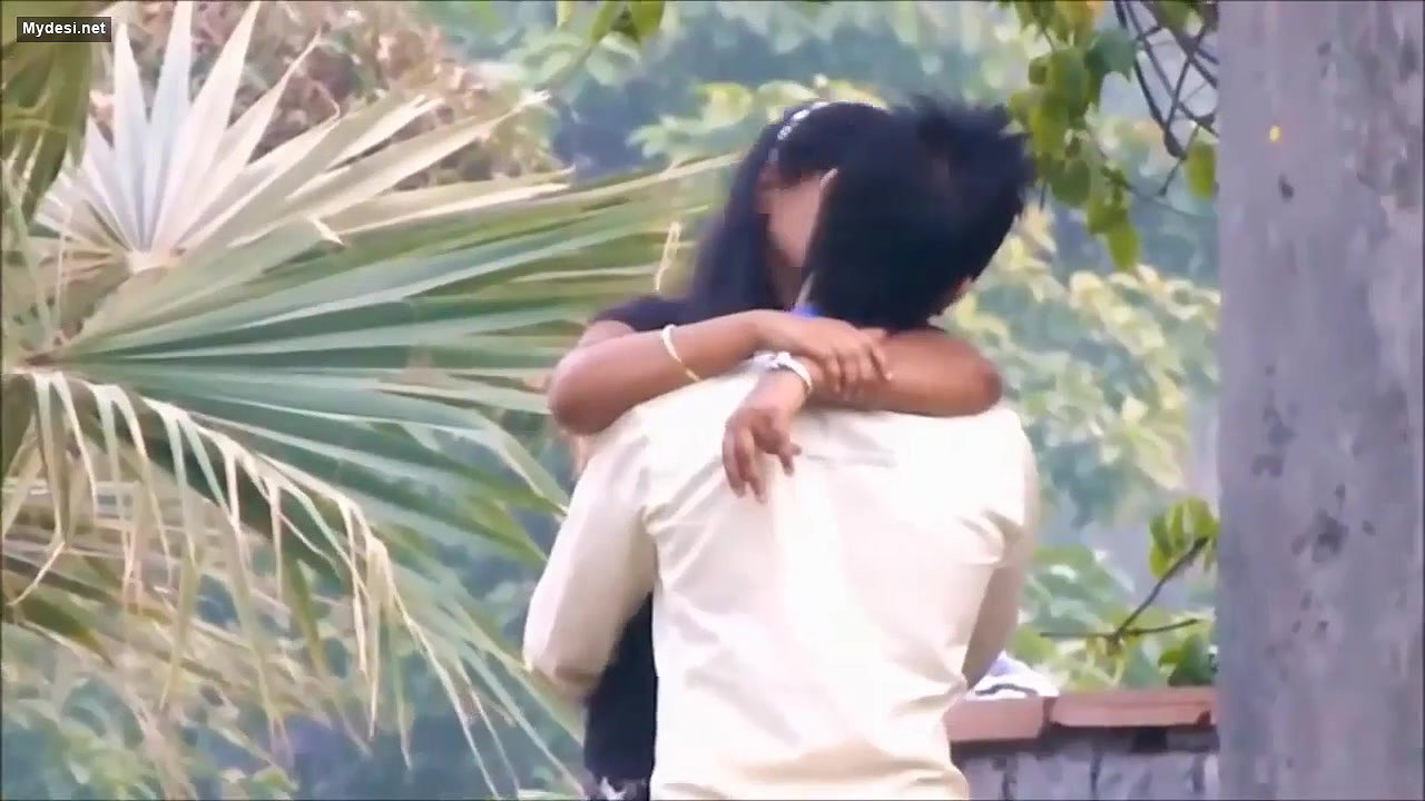 Lovers Smooching in Park