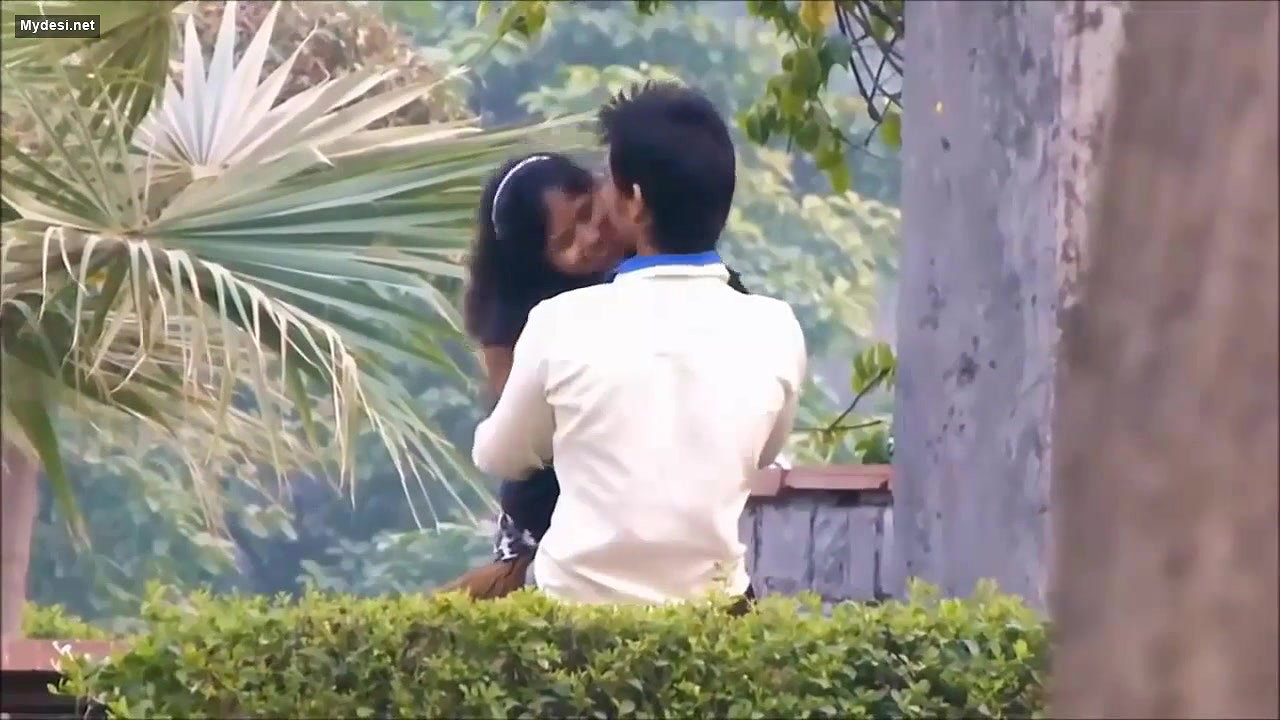 Lovers Smooching in Park