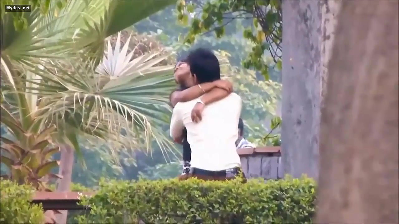 Lovers Smooching in Park
