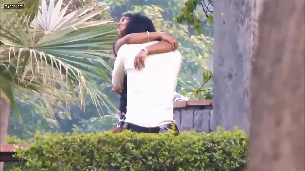 Lovers Smooching in Park