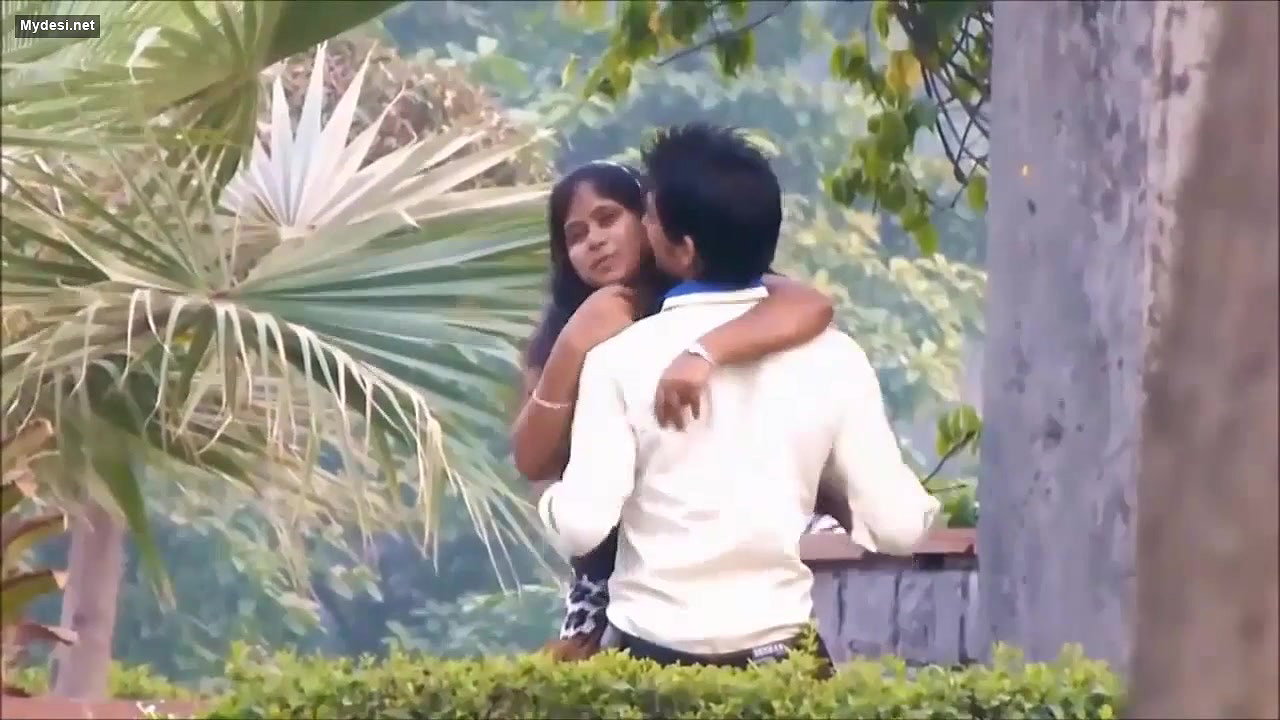 Lovers Smooching in Park
