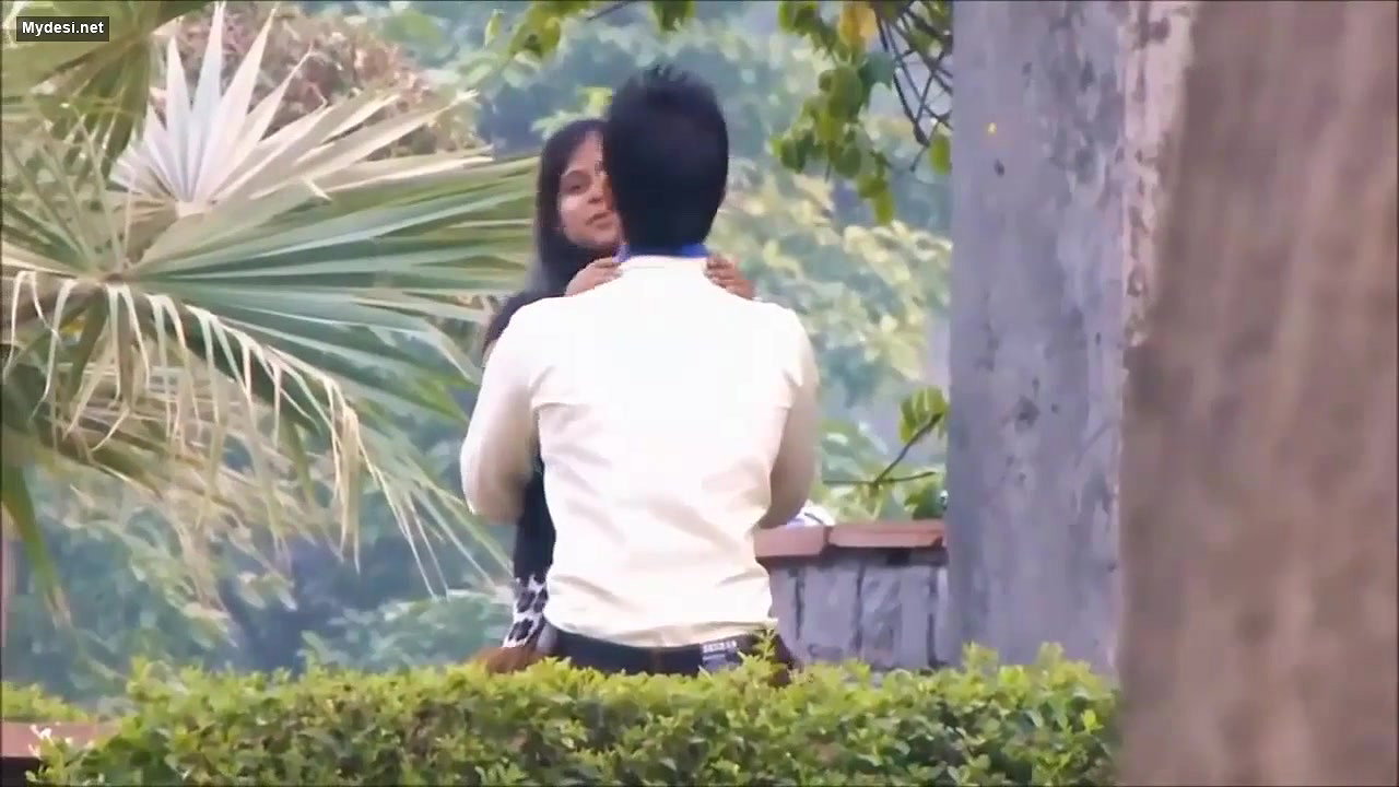 Lovers Smooching in Park