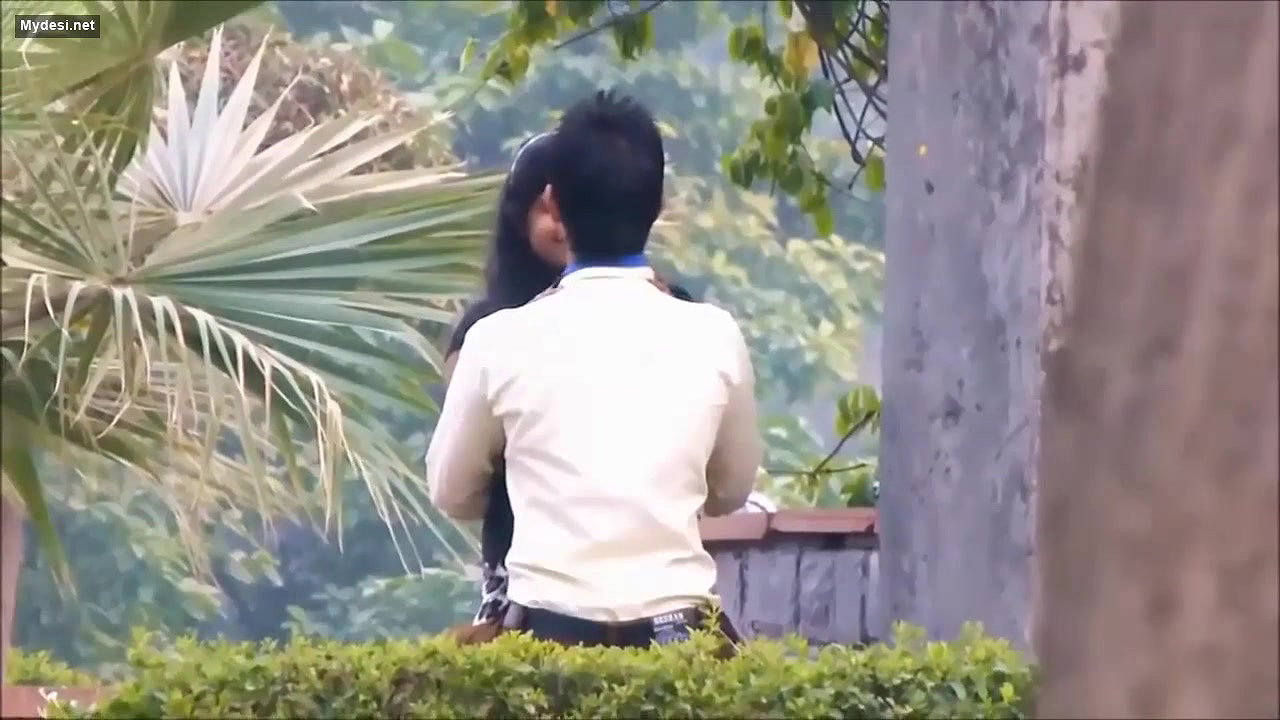 Lovers Smooching in Park