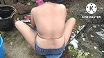 Hot indian house wife bathing outside and washing clothes